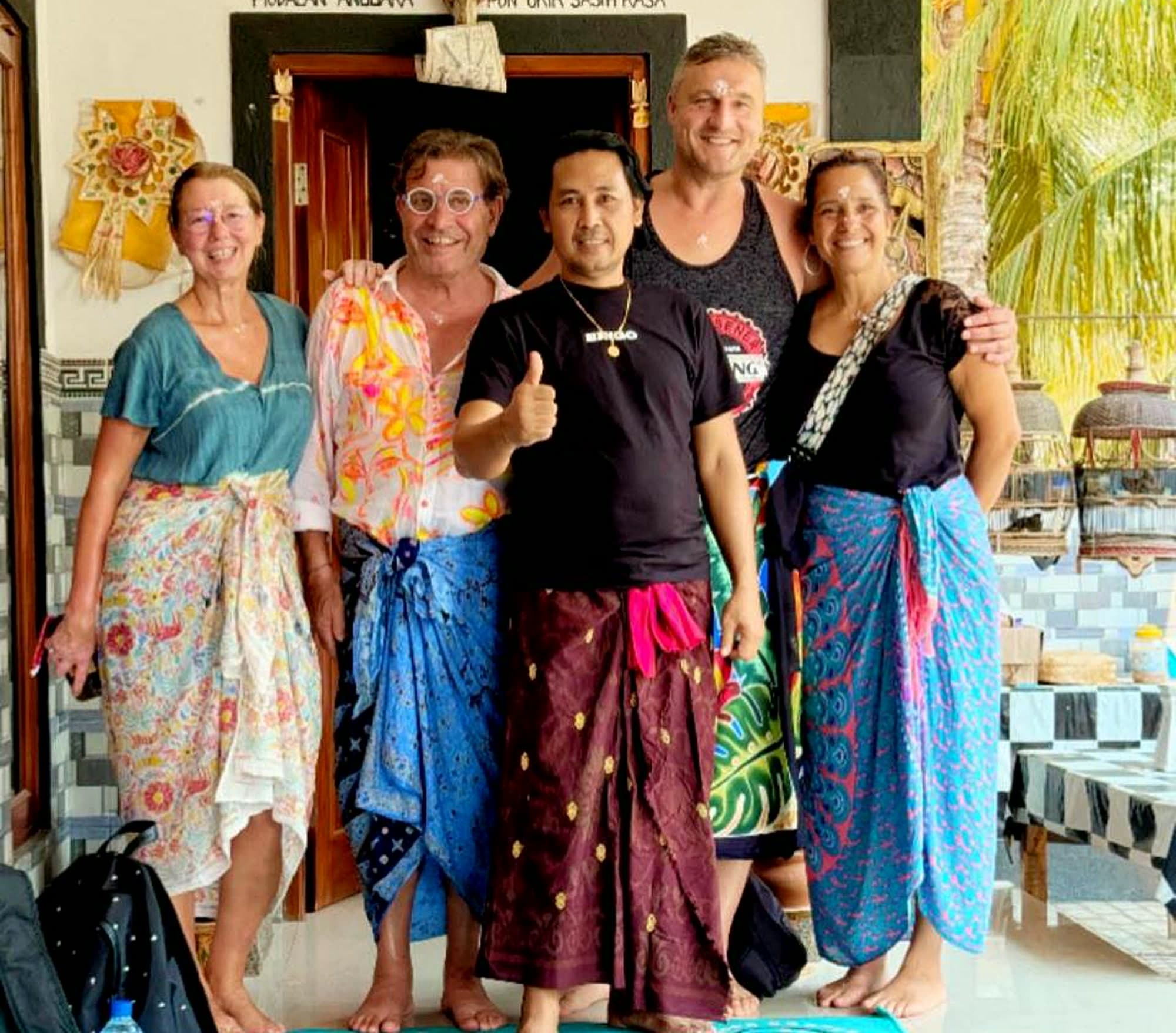 JRO with an international client family after a healing session.